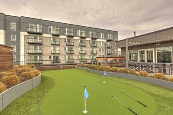 Sparc apartments rooftop deck with putting green